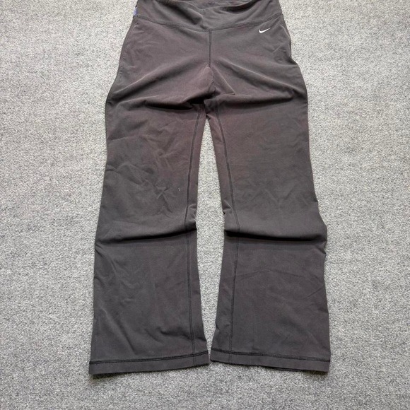 Nike Pants - Y2K women's Nike flare leggings size medium black/purple